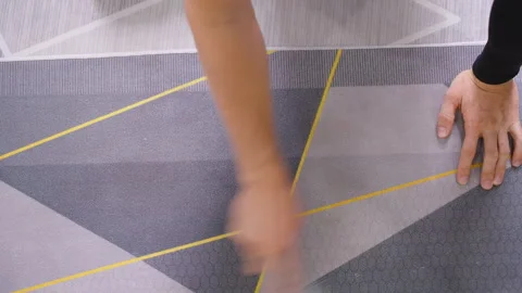 Close Up of Hand Scrubbing Carpet with Small Brush on Patterned Rug, Cleaning Stock Footage 315236244