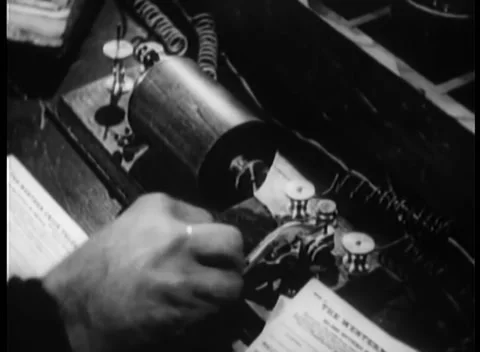 Close-up hand sending morse code message Stock Footage 260250442