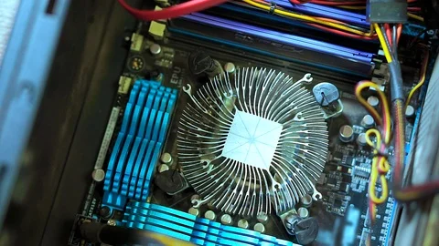 Close-up of hand serviceman uninstall CPU heatsink shows it . 動画素材 105397679