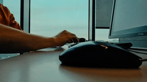 Close Up Hand Shot Using Mouse And Keyboard Stock Footage 339941933