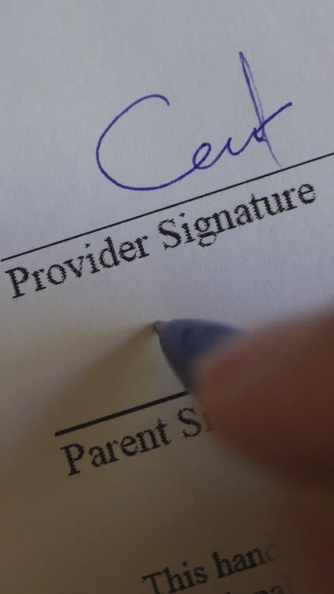 Close-Up Of A Hand Signing A Document With A Pen Stock Footage 302540815