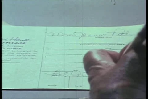 Close-up of hand signing name Stock Footage 11348669