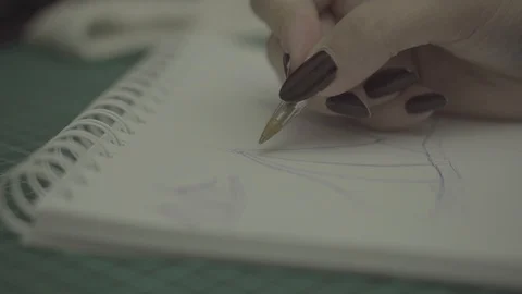 Close up of hand sketching on paper Stock Footage 94152520