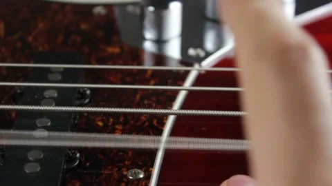 Close-up of Hand Slapping Bass String Stock Footage 158246316