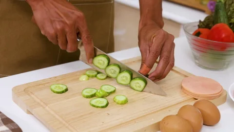 Close up hand slice vegetables cooking for dinner preparing for hot soup, l.. Stock Footage 255400884