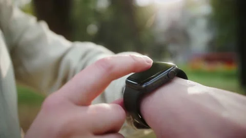Close up hand with smartwatch. Checking incoming notification on smart watch Stock Footage 142011964