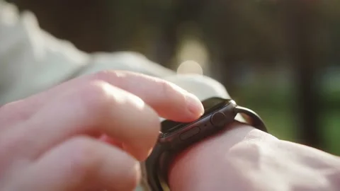 Close up hand with smartwatch. Scrolling display on smartwatch. Stock Footage 140780875