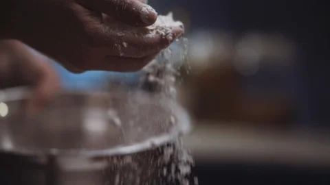 Close up hand sprinkling flour Video stock 91899417