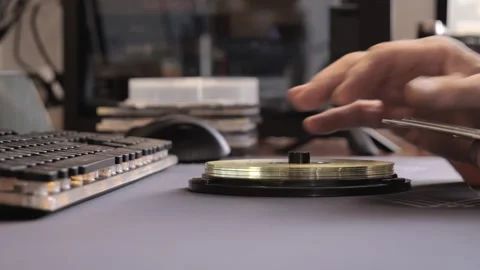 Close-up of hand stacking CDs Stock Footage 312166800