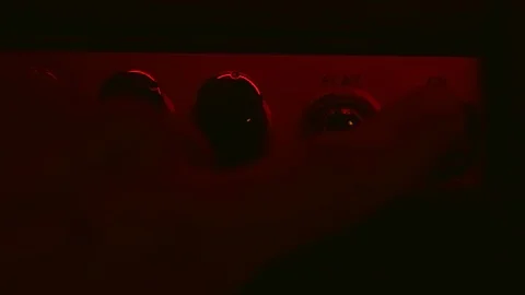 Close up of Hand Switch On and Off the Amplifier 動画素材 123858387
