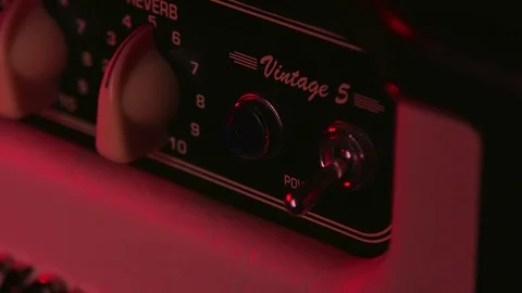 Close up of Hand Switching on and off Guitar Amplifier 库存影片 123857745