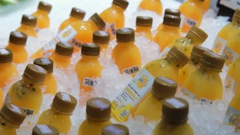 Close-up of hand taking fresh juice from ice Stock Footage 261165165