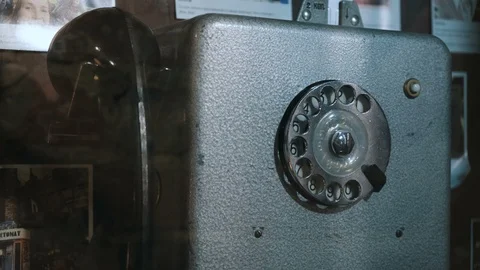 Close up of hand taking handset and dial the number in the phonebooth Stock Footage 127598701