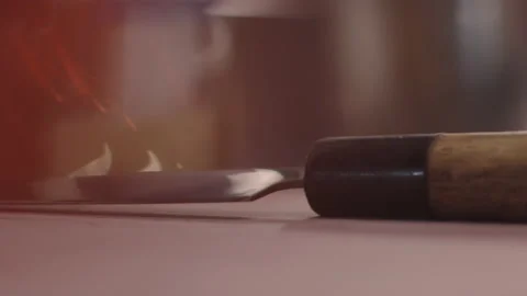 Close-up of a hand taking a kitchen knife in slow motion. Stock Footage 172073651