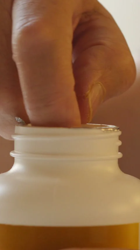 Close Up Of Hand Taking Pill From A Bottle. Vertical. Stock Footage 297862184