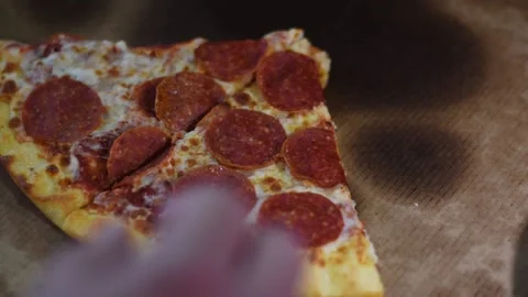 Close up hand taking a portion of pizza Stock Footage 237175876