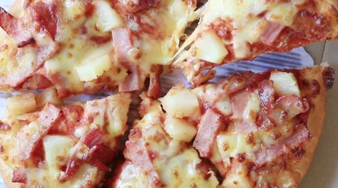 Close up a hand taking a slice pizza. Stock Footage 45586248
