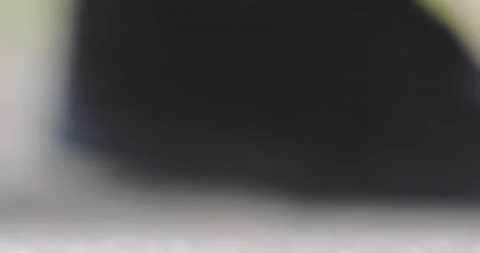 Close up  hand as they fire a marble toy with their thumb Vidéo 154058097