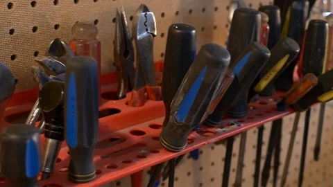 Close-up of hand tools on a garage workbench. Stock Footage 100650152