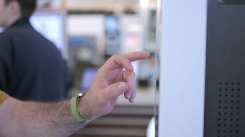 Close-up of hand touching interactive screen in public space Stock Footage 341478291