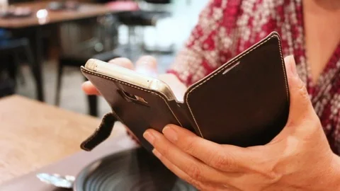 Close up of hand touching on smartphone with blurred background. Stock Footage 118521715