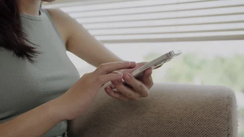 Close-Up of Hand Touching Smartphone Screen: Modern Communication Technology, Stock Footage 249954084