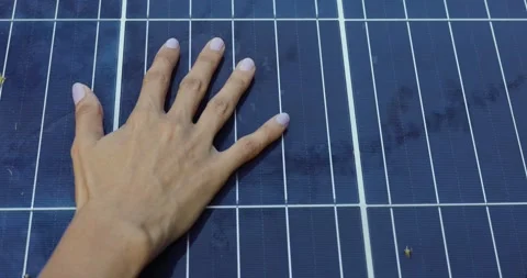 Close up of hand touching solar panel Stock Footage 249182741