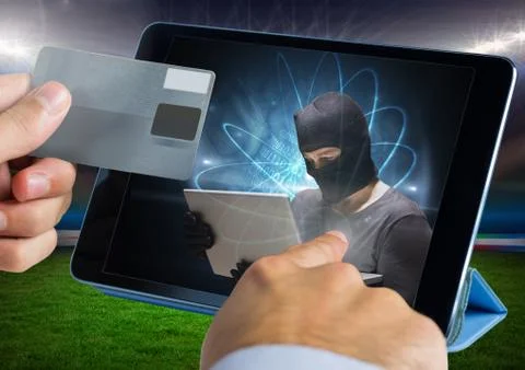Close up of hand touching a tablet with hacker and holding credit card Stock Photos