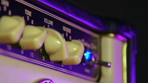 Close up of Hand Turn on Amplifier and Turn Up Volume 動画素材 123857985