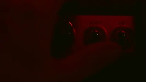 Close up of Hand Turn Amplifier Power and Play Button On and Off 動画素材 124087186