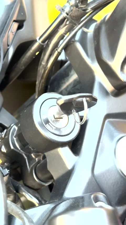 Close-Up of Hand Turning Car Ignition Key Before a Road Trip Stock Footage 341672711