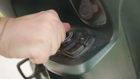 Close-Up of Hand Turning Key in Scooter Ignition Switch Before Ride, macro Stock Footage 310085013