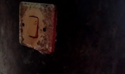 Close Up of Hand Turning Light Switch On and Off Stock Footage 321937483