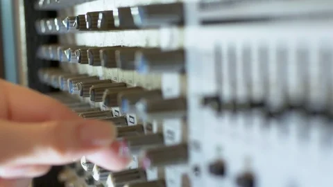 Close-up. Hand Turns the pan knob on the sound mixer Video stock 112582442