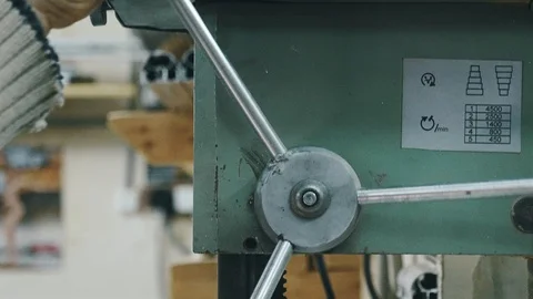 Close-up of the hand that twists the handle of the drill. metal drilling Video stock 104497714