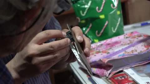 Close-up of the hand of two men pointing to an object explaining and indicating  Stock Footage 140402522