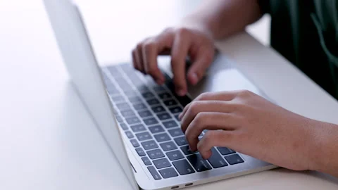 Close-up hand typing computer on keyboard for studying in private course , .. Stock Footage 245489780
