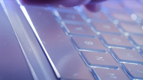 Close Up of a hand typing on a computer laptop digital code on the keyboard a Stock-Footage 124704082