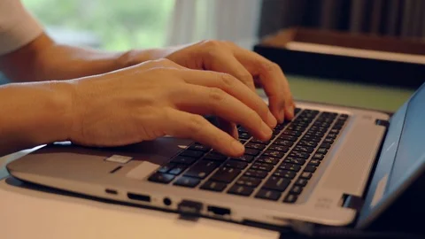 Close-up hand typing keyboard computer notebook in the room Stock Footage 111267644