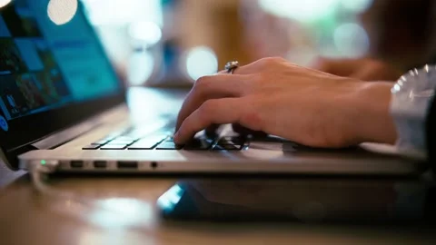 Close-up of hand typing on a laptop keyboard Stock Footage 165165606
