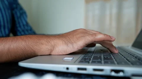 Close-Up of Hand Typing on Laptop Keyboard Stock Footage 317737422
