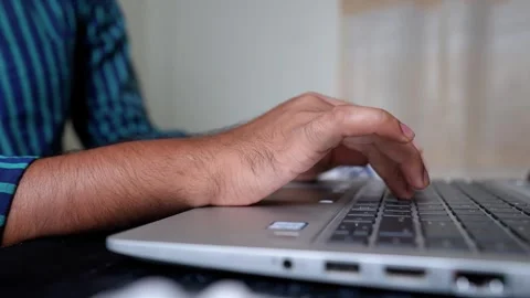 Close-up of Hand Typing on Laptop Keyboard Stock Footage 320725116