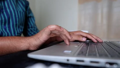 Close-up of Hand Typing on Laptop Keyboard Stock Footage 320725138