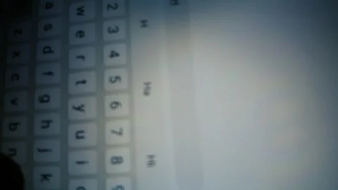 Close-up of Hand Typing Message on Smartphone Keyboard at Night, Mobile Stockbeeldmateriaal 324885557