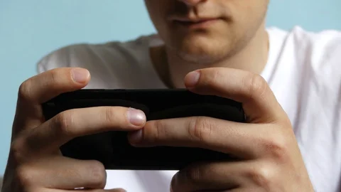 Close-up of a hand typing sms on a smartphone. Online surfing in social netwo Stock Footage 107664827