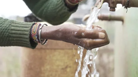 Close Up Of Hand Under Running Water From Faucet. Stock Footage 320347026