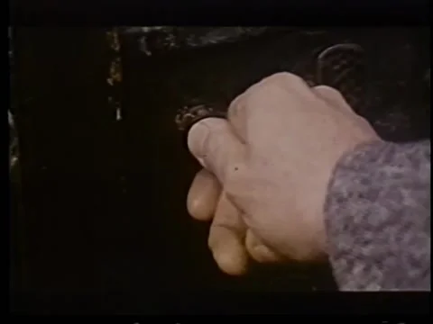 Close-up of hand unlocking door with skeleton key Видео 260247514