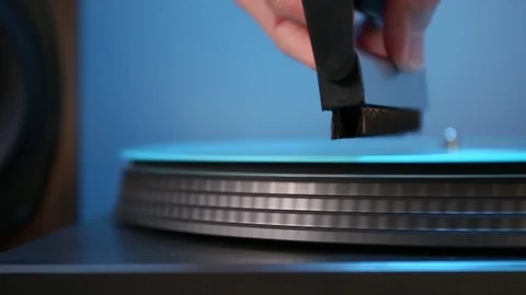 Close up on hand using anti-static record brush. 스톡 동영상 121230468