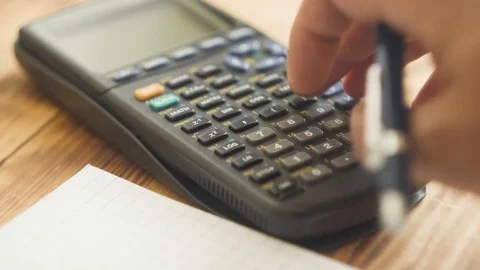 Close up of hand using calculator 2 Video stock 94015391