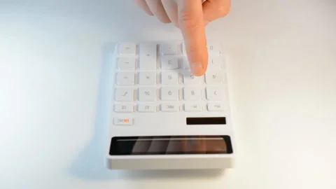 Close up hand using calculator Stock Footage 164930059